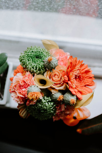 What flowers should you include in your Bespoke Flower Arrangements to brighten up your home?